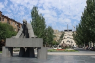 Monument to Tamanian with the Cascade as backdrop